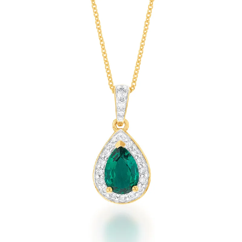 Women’s diamond and gold necklace-9ct Yellow Gold Created Emerald and 0.15 Carat Diamond Pear Halo Pendant on 45cm Chain