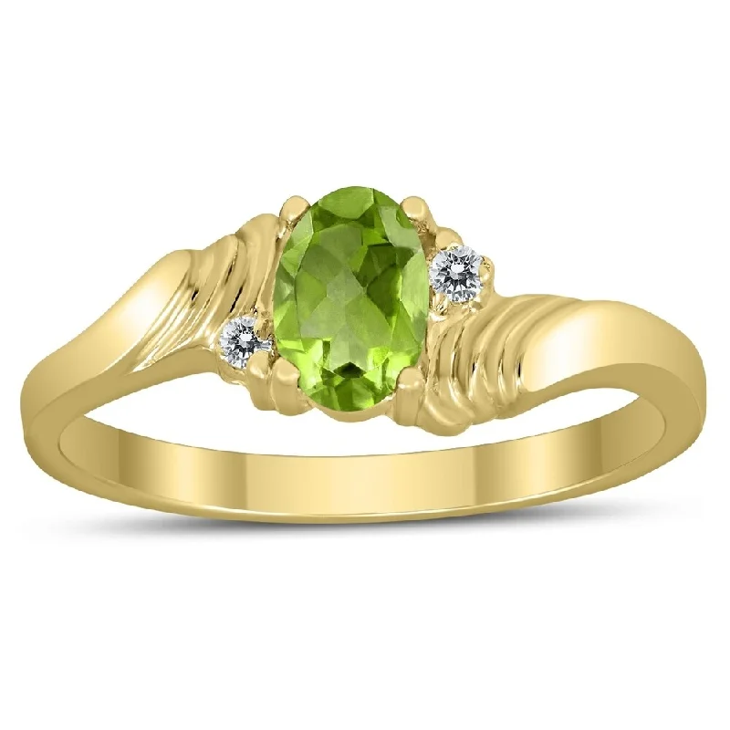 Women’s twisted gold ring-6X4MM Peridot and Diamond Wave Ring in 10K Yellow Gold