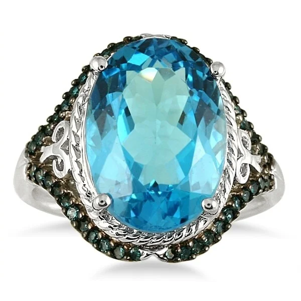 Women’s custom ring-7 1/2 Carat Oval Blue Topaz and Blue Diamond Ring in 10K White Gold