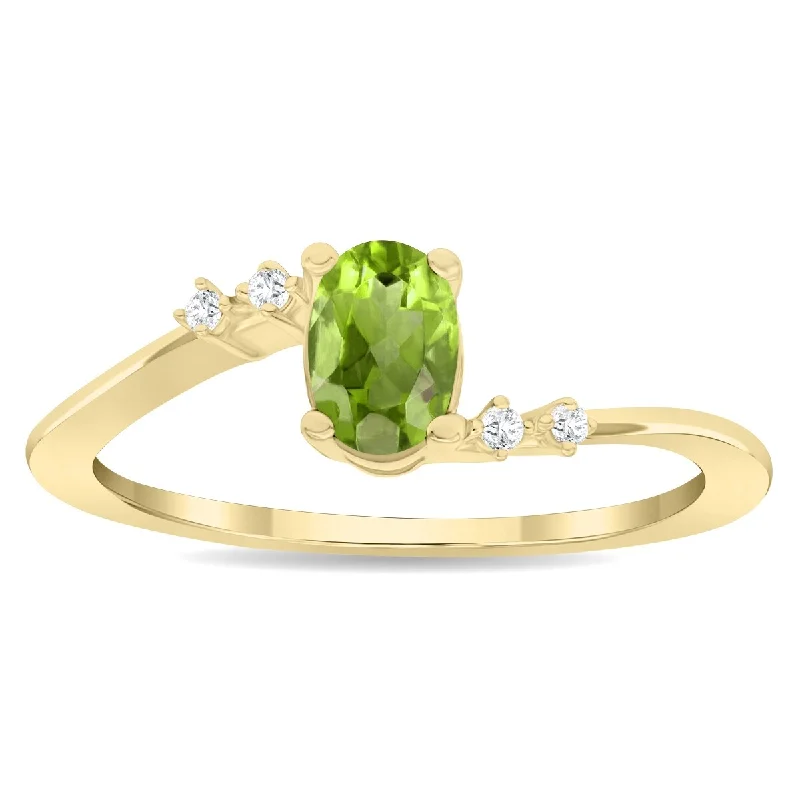 Women’s pearl statement ring-Women's Oval Shaped Peridot and Diamond Tierra Ring in 10K Yellow Gold