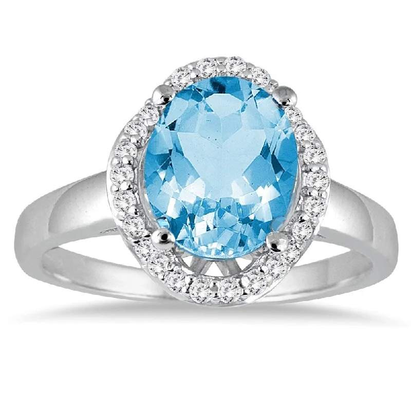 Women’s solitaire ring-3 1/2 Carat Oval Blue Topaz and Diamond Ring in 14k White gold