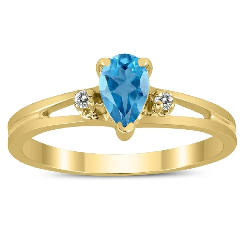 Women’s chunky ring-6X4MM Blue Topaz and Diamond Pear Shaped Open Three Stone Ring in 10K Yellow Gold