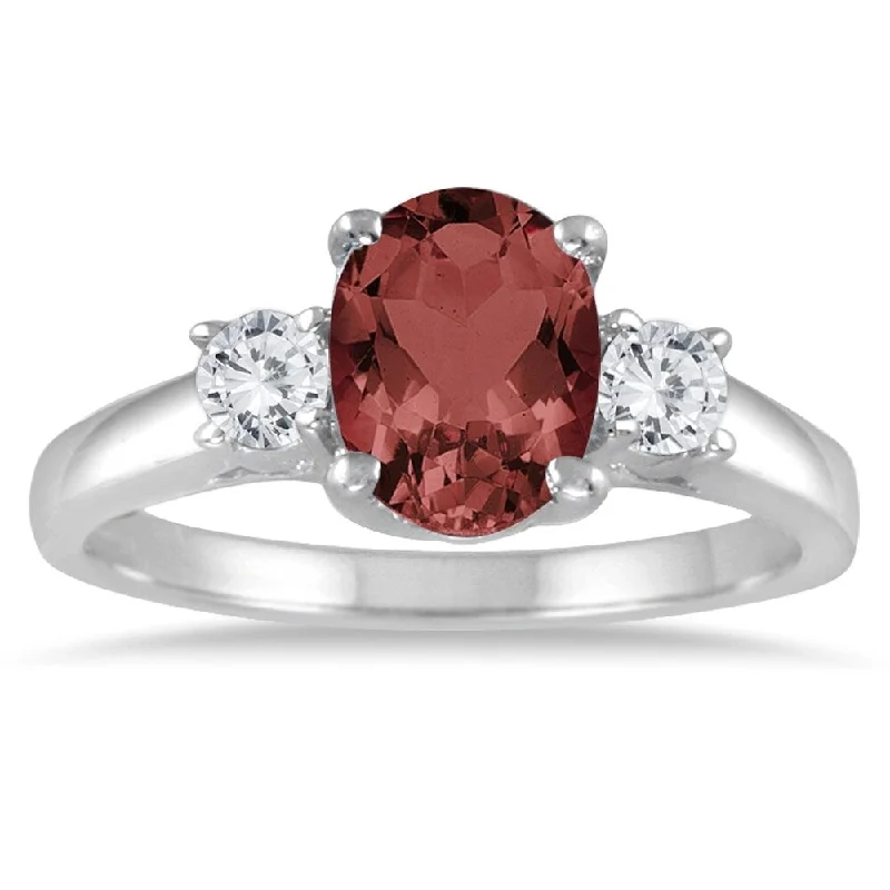 Women’s multi-stone ring-1 3/4 Garnet and Diamond Three Stone Ring 14K White Gold