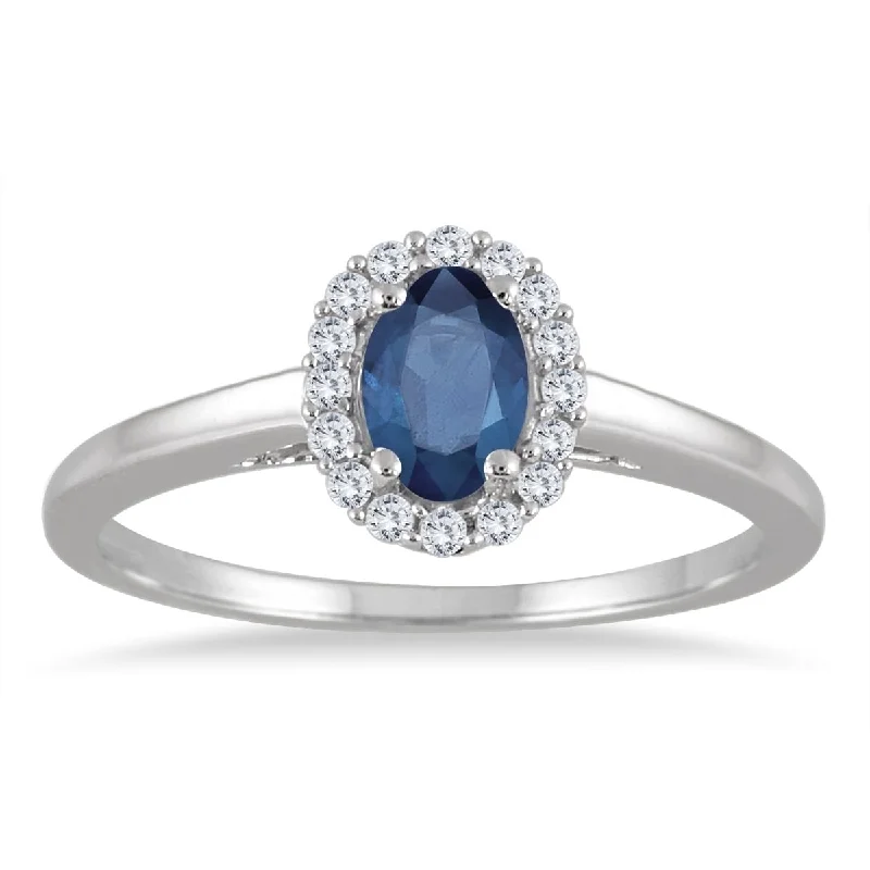 Women’s custom ring-6x4MM Oval Shape Sapphire and Diamond Halo Ring in 10K White Gold