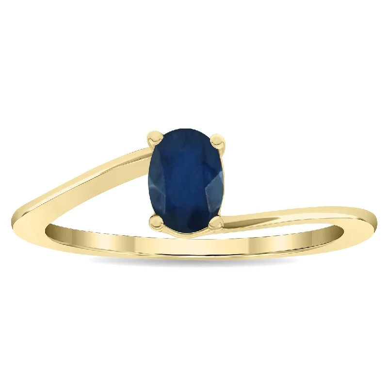 Women’s butterfly ring-Women's Solitaire Oval Shaped Sapphire Wave Ring in 10K Yellow Gold