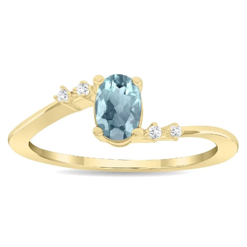 Women’s simple gold ring-Women's Oval Shaped Aquamarine and Diamond Tierra Ring in 10K Yellow Gold