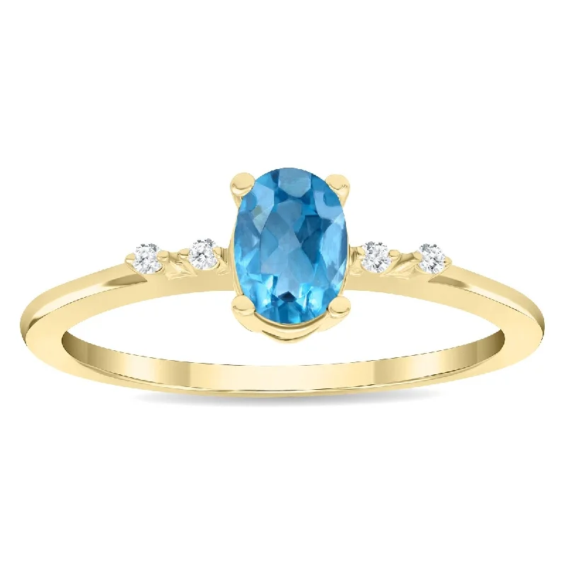 Women’s art deco ring-Women's Oval Shaped Blue Topaz and Diamond Sparkle Ring in 10K Yellow Gold