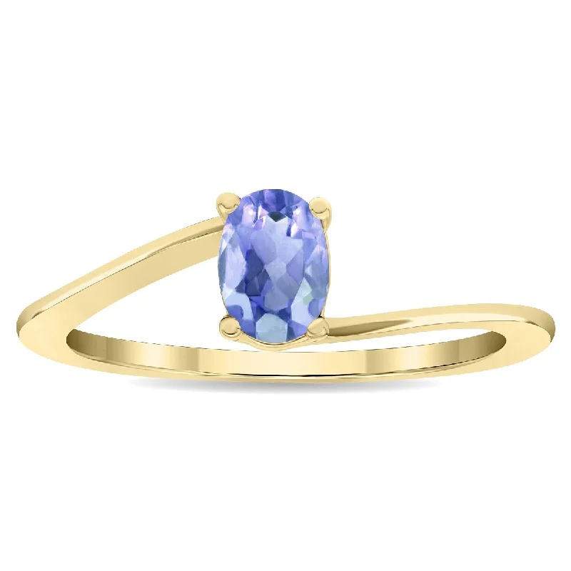 Women’s engraved ring-Women's Solitaire Oval Shaped Tanzanite Wave Ring in 10K Yellow Gold